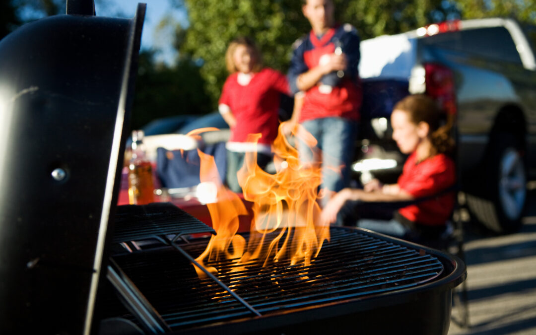 Tailgating: Flames Rise As Charcoal Is Prepped For Cooking